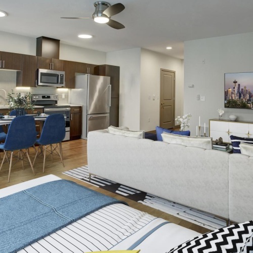 Wide open living areas flooded with natural light a living room with a large bed and a tv