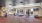 a room with exercise equipment and a rug