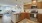 a kitchen with wooden cabinets
