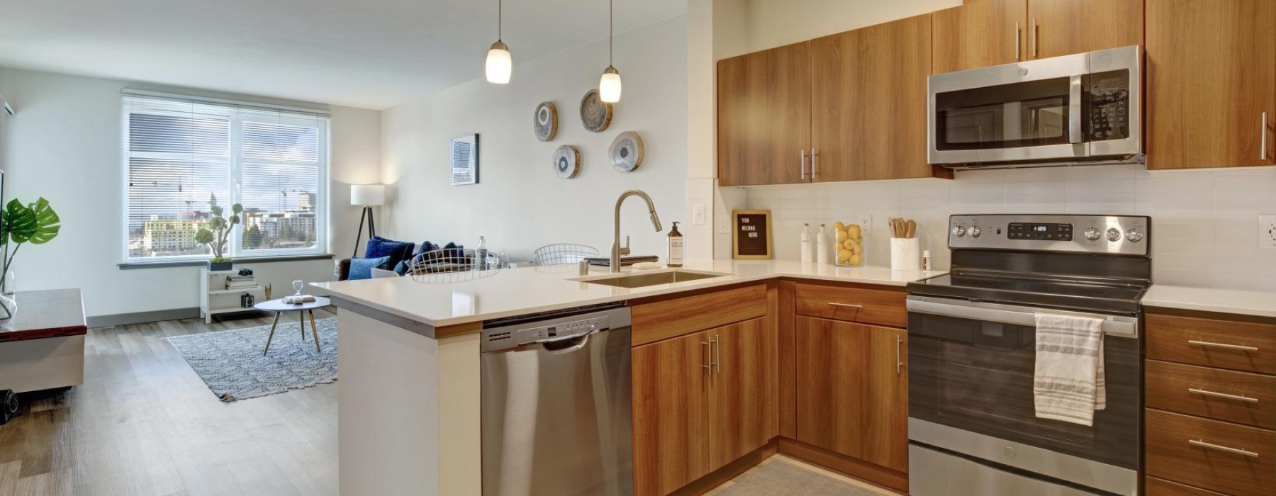a kitchen with wooden cabinets