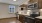 a kitchen with black appliances