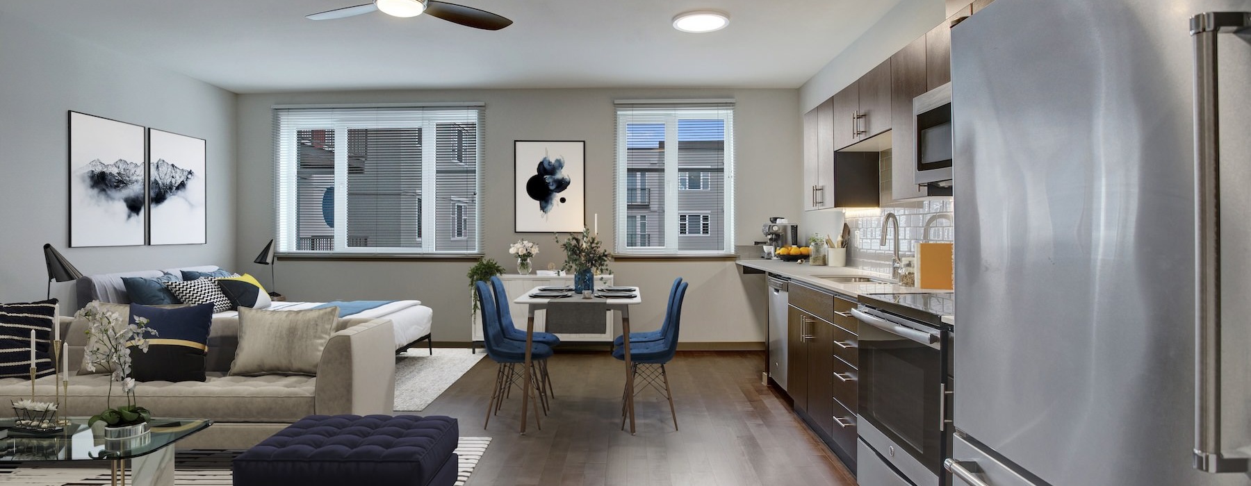 a kitchen with a couch and a table