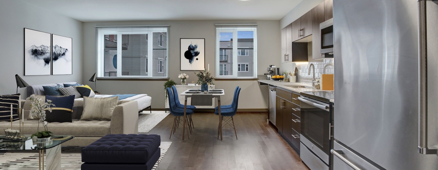 a kitchen with a couch and a table
