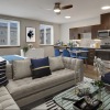 a living room with a couch and coffee table