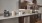 a kitchen with wooden cabinets