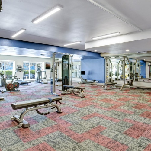 Quick access to state-of-the-art amenities a gym with exercise equipment